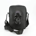 COMECO INC - METALLIC PROTRUDED SKULL MESSENGER BAG IN VINYL